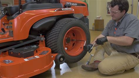 youtube kubota track adjustment